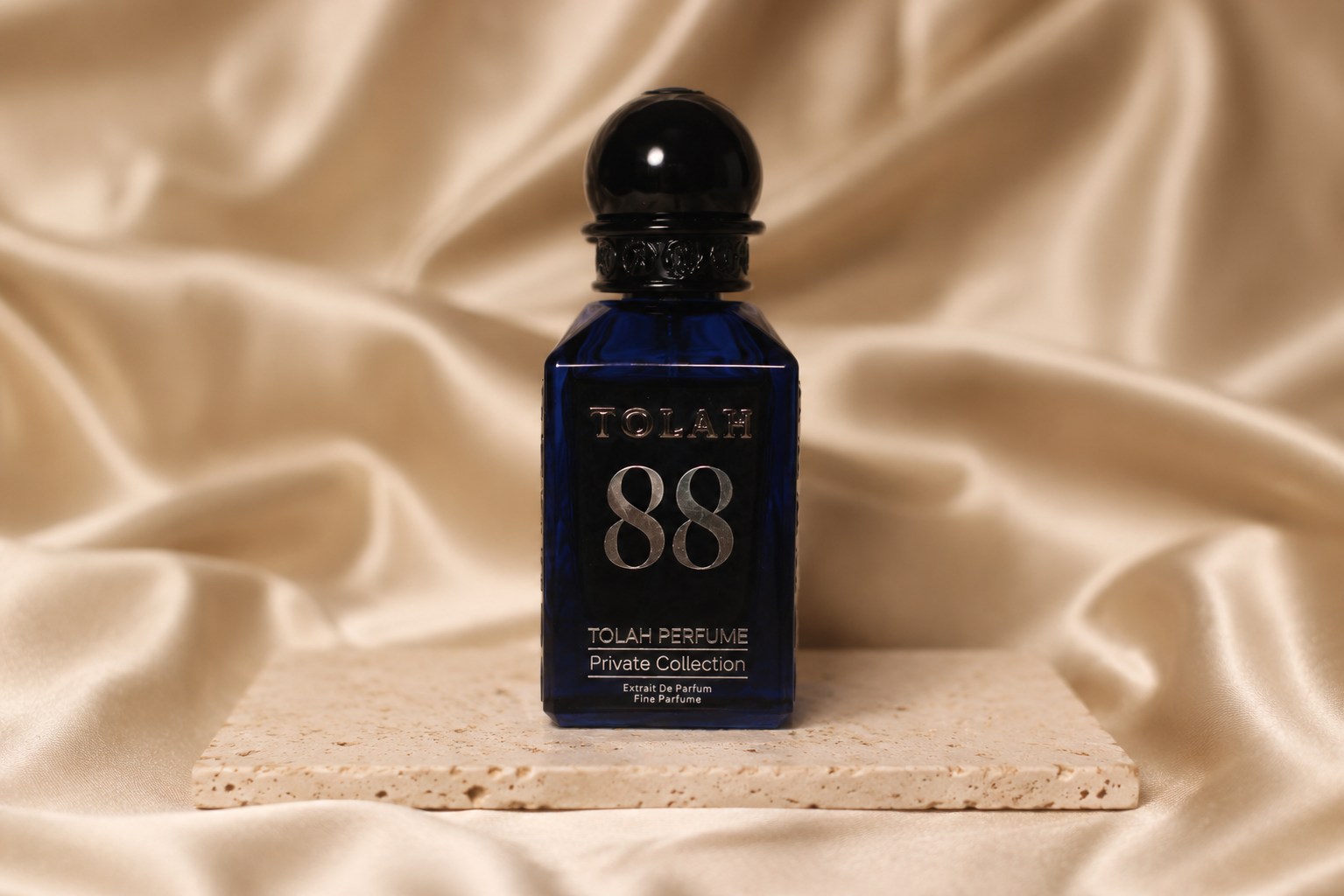 عطر توله 88 على حجر وقماش حريري